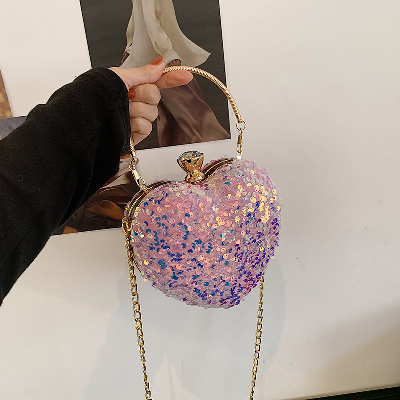 Sequined heart-shaped handbags