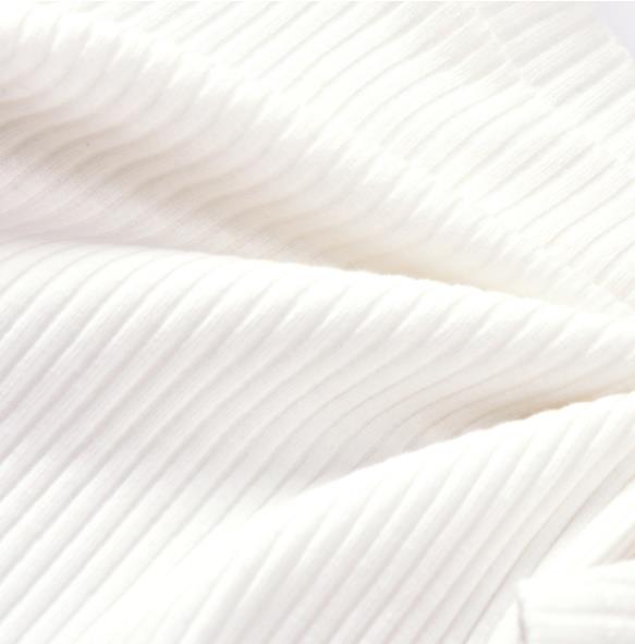 Ruched sleeves and fringed skirt