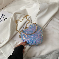 Sequined heart-shaped handbags