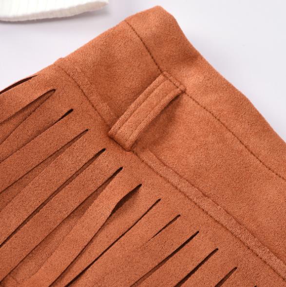 Ruched sleeves and fringed skirt