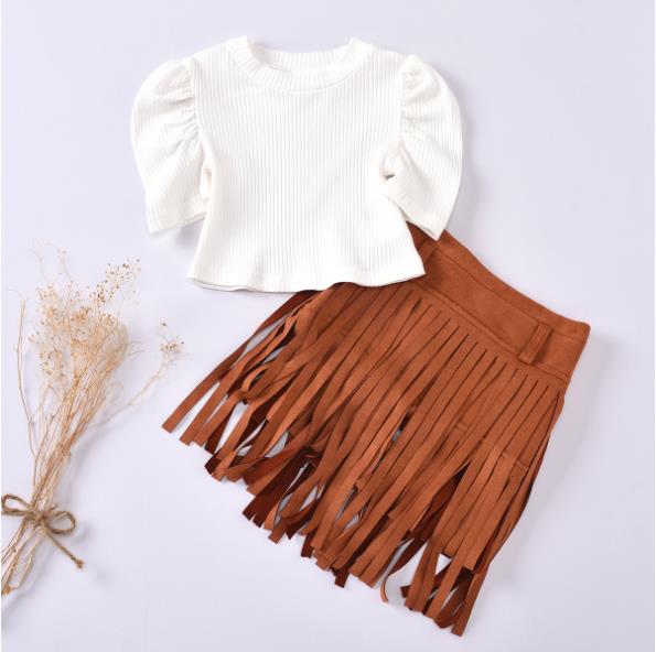 Ruched sleeves and fringed skirt