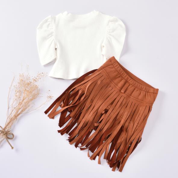 Ruched sleeves and fringed skirt