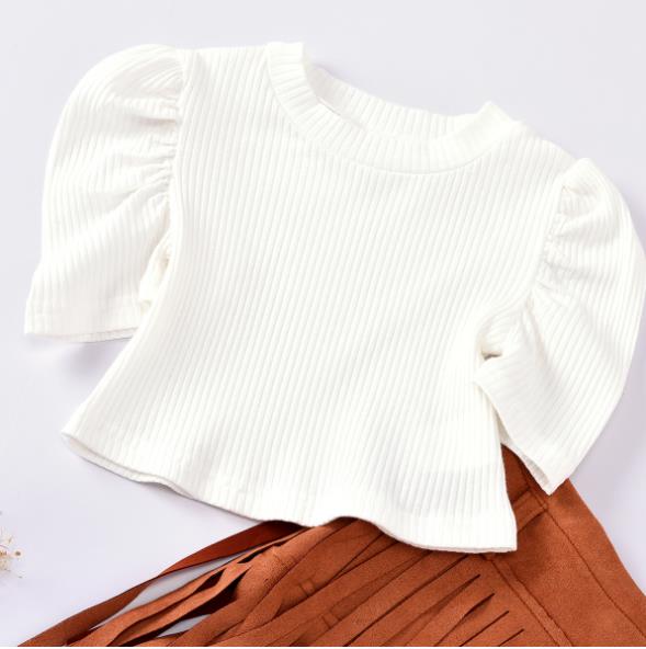 Ruched sleeves and fringed skirt