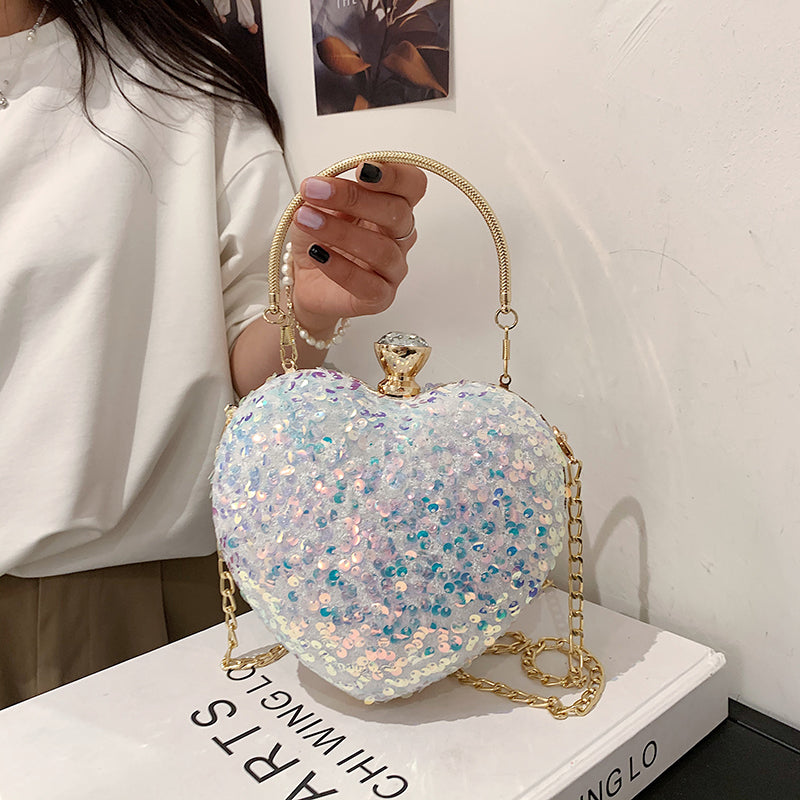 Sequined heart-shaped handbags