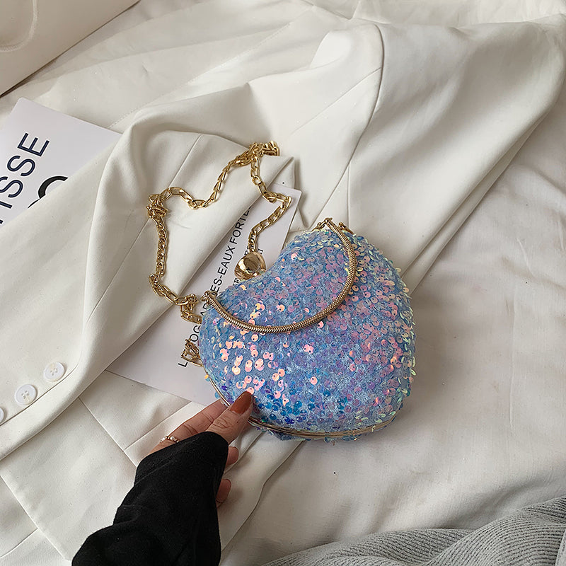 Sequined heart-shaped handbags